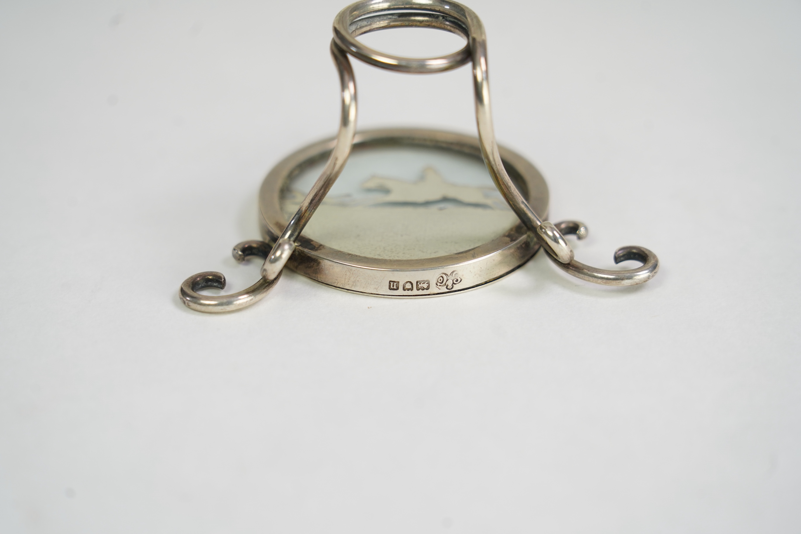 A set of four Edwardian silver menu holders, by Elkington & Co